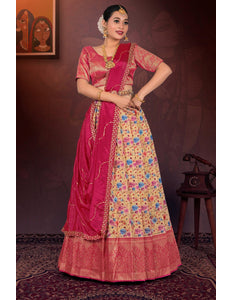 Woman in traditional pink and floral lehenga choli with dupatta