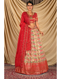 Woman wearing a peach traditional outfit with floral design