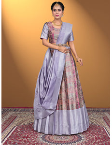 Woman wearing a traditional outfit with a patterned lehenga choli
