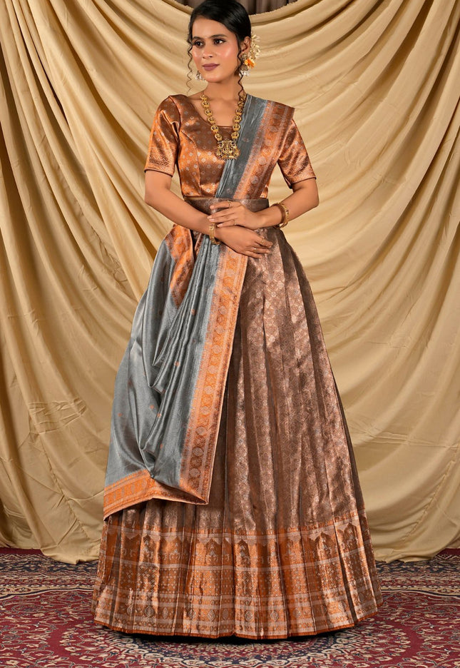 Woman wearing a traditional outfit with a lehenga choli with dupatta