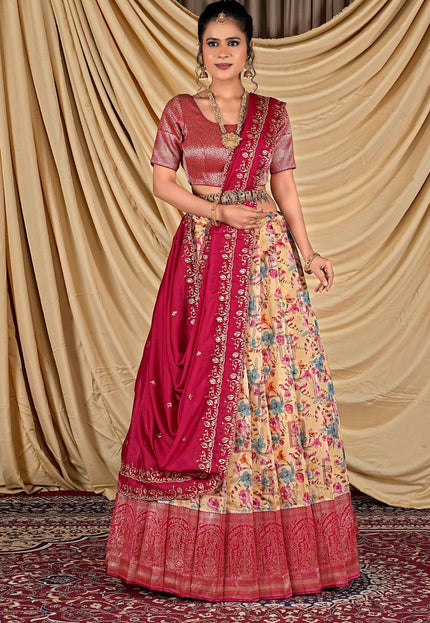 Woman wearing a traditional outfit with a pink lehenga and floral print