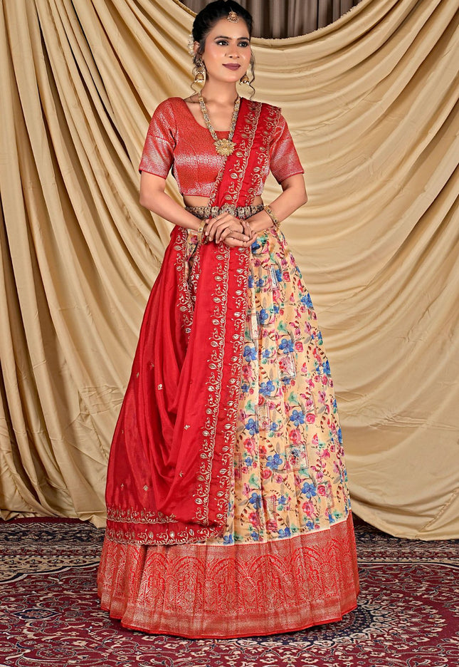 Woman wearing a traditional red and floral lehenga choli with dupatta