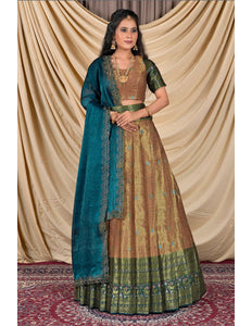 Woman wearing a traditional outfit with a blue dupatta