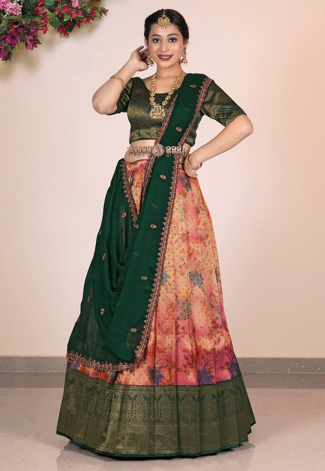 Woman wearing a traditional Pink and Green lehenga