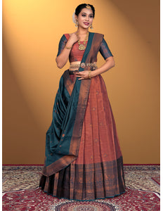 Woman wearing a traditional lehenga with a Pink blouse