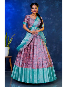 Woman wearing a colorful lehenga choli with dupatta