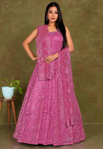 Woman wearing a pink embroidered dress  Pink Colour Party Wear Net Gown For Women