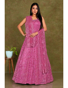 Woman wearing a pink embroidered dress  Pink Colour Party Wear Net Gown For Women