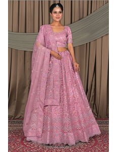 Woman in a pink traditional outfit