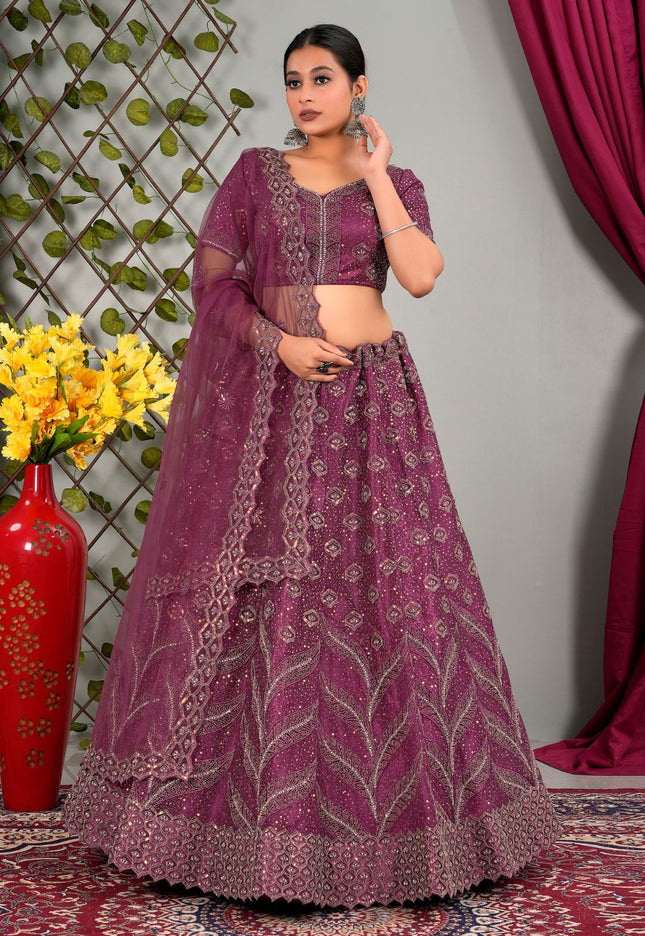 Woman in a purple embroidered traditional lehenga choli
