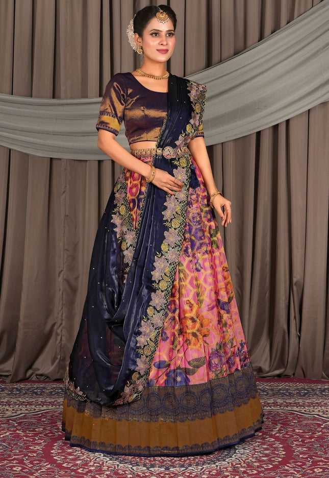 Woman in a traditional multicolored lehenga choli with dupatta