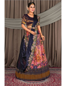 Woman in a traditional multicolored lehenga choli with dupatta