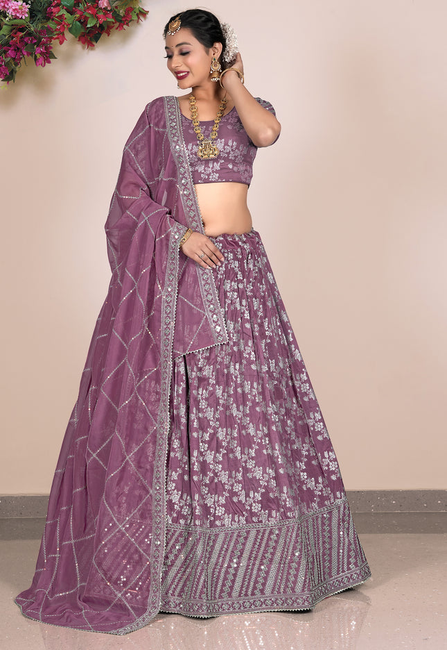 Woman wearing a purple traditional outfit with floral patterns