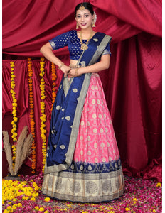Woman in traditional blue and pink lehenga choli