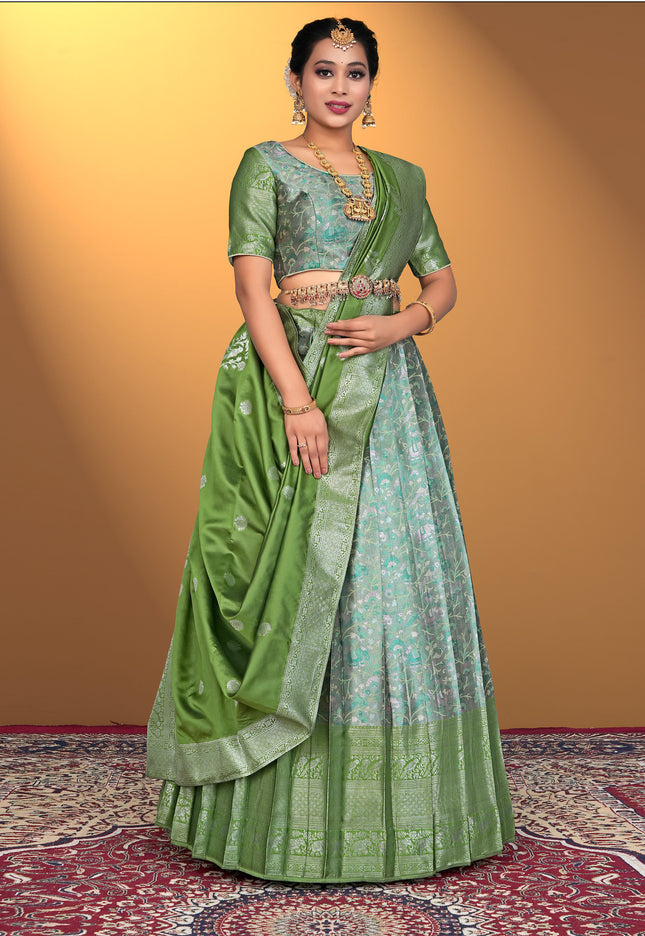 Woman wearing a green lehenga with a matching blouse