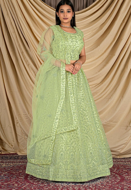 Woman wearing a light green traditional outfit