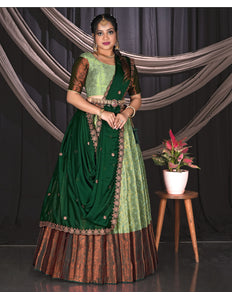 Woman wear in a Pista and Green traditional Lehenga Choli