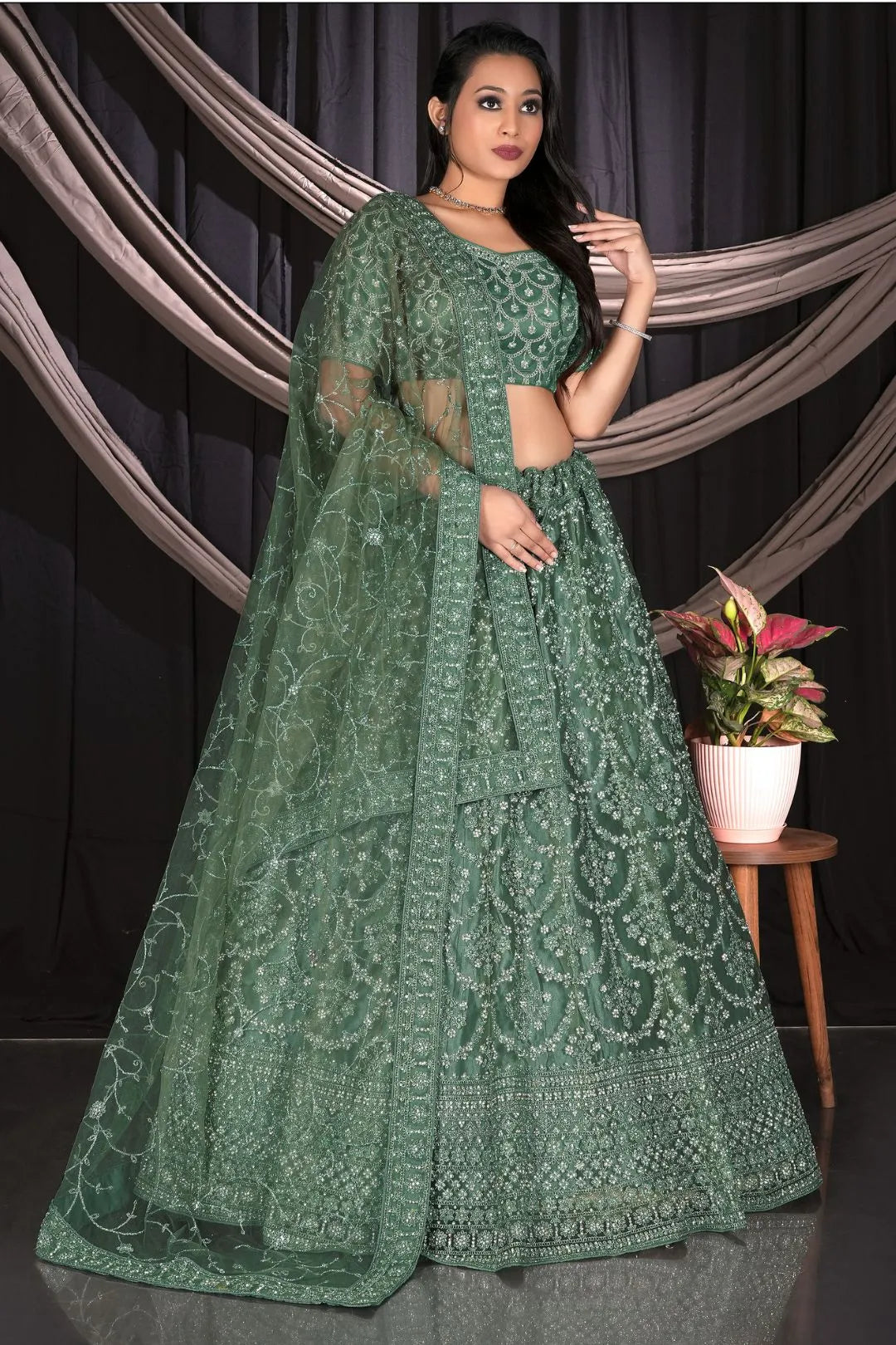 Pista Net Semi Stitch Embroidered Lehenga Choli For Women