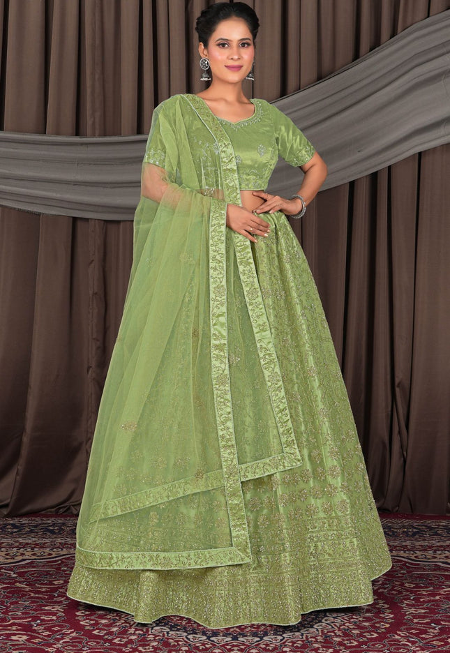 Woman wearing a green traditional outfit