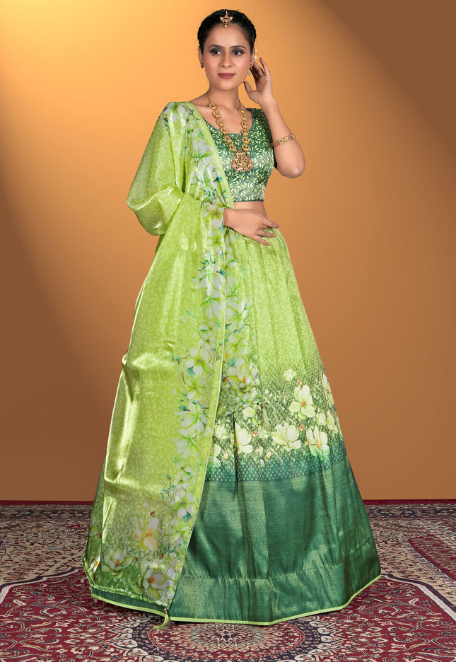 Woman wearing a green floral lehenga  with a matching blouse