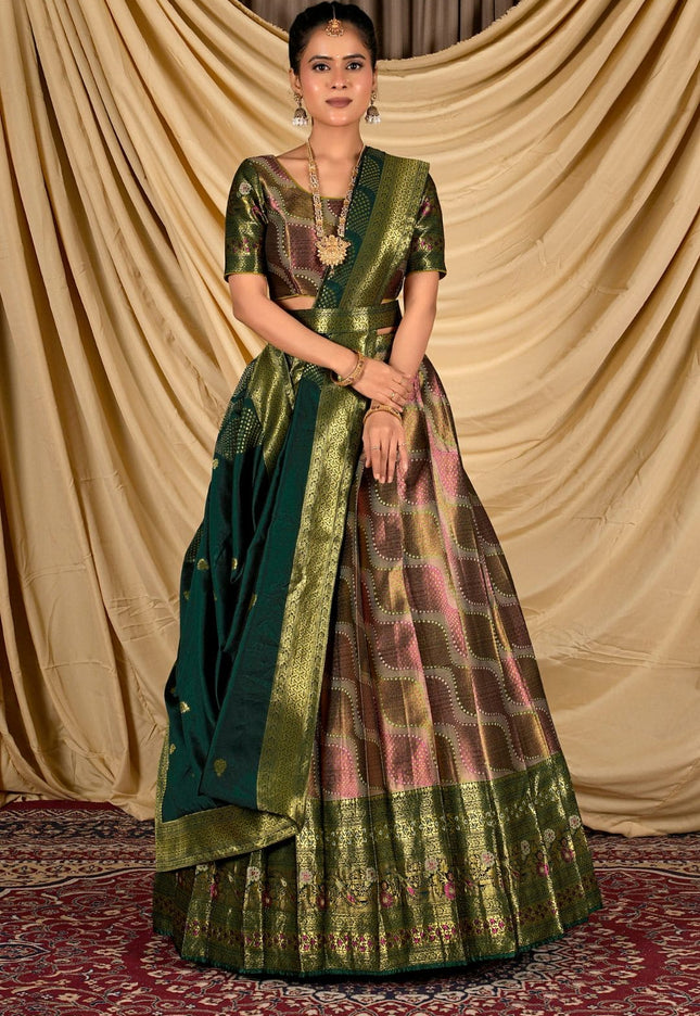 Woman wearing a traditional green lehenga with a patterned blouse
