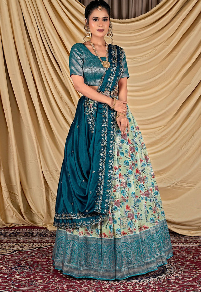 Woman wearing a traditional pista and floral lehenga choli with dupatta