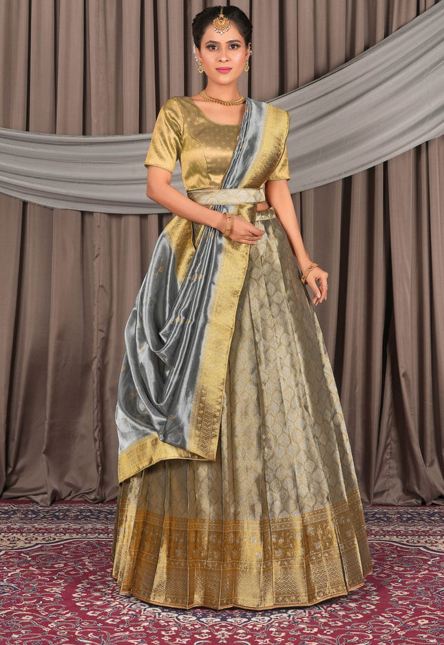 Woman wearing a traditional outfit with a lehenga and blouse