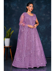 Woman wearing a purple embroidered dress Net Gown With Dupatta