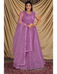 Woman wearing a purple traditional outfit