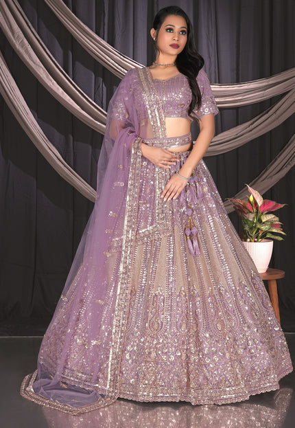 Woman in a purple embroidered traditional outfit