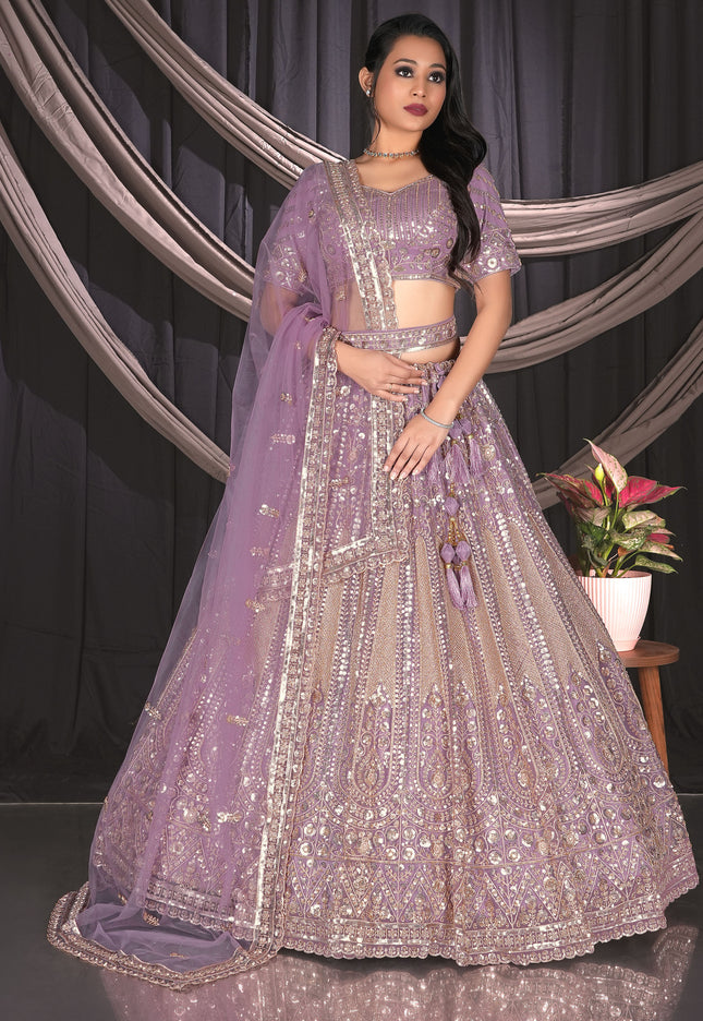Woman in a purple embroidered traditional outfit