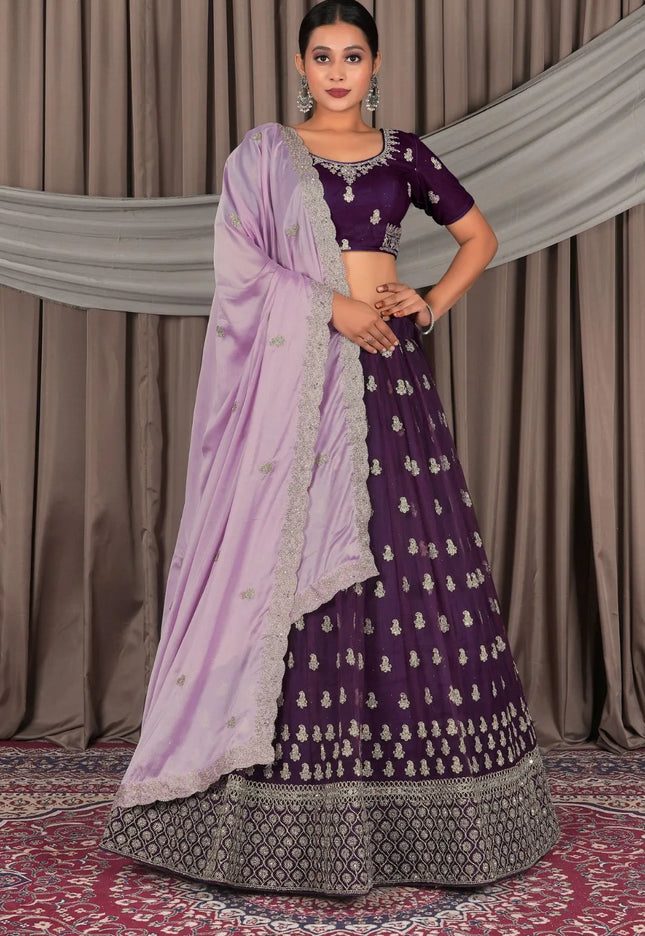Purple Net Designer Lehenga Choli with Rangoli Dupatta
