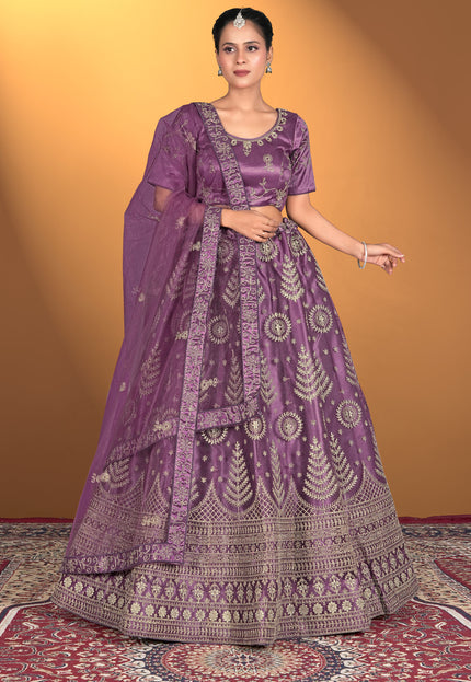 Woman wearing a purple embroidered traditional outfit