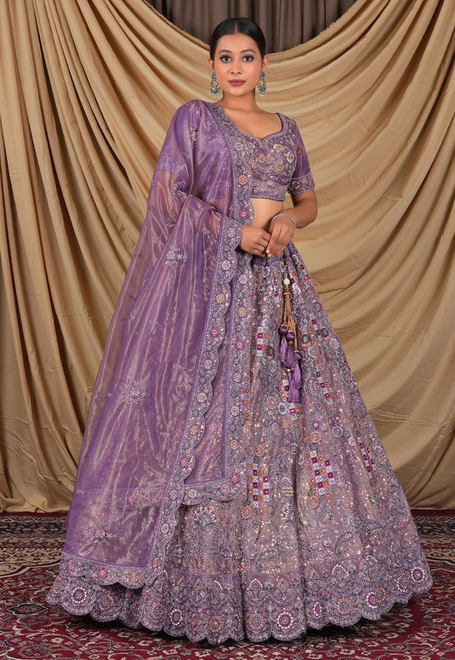 Woman wearing a purple embroidered traditional outfit