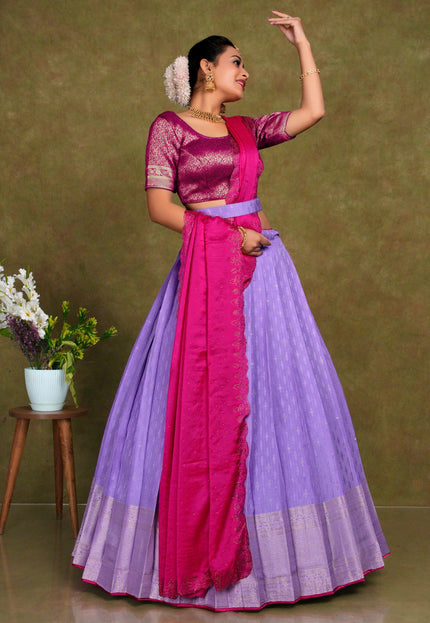 Woman in a pink and purple traditional outfit