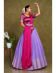 Woman in a pink and purple traditional outfit