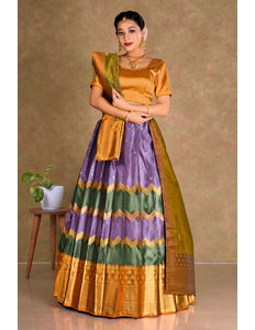 Woman wearing a traditional outfit with a purple and green skirt and gold top