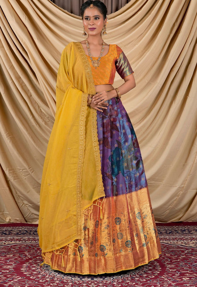 Woman wearing a traditional outfit with a yellow blouse and colorful skirt