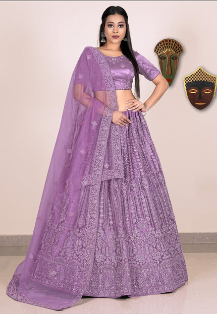 Woman wearing a purple embroidered lehenga
