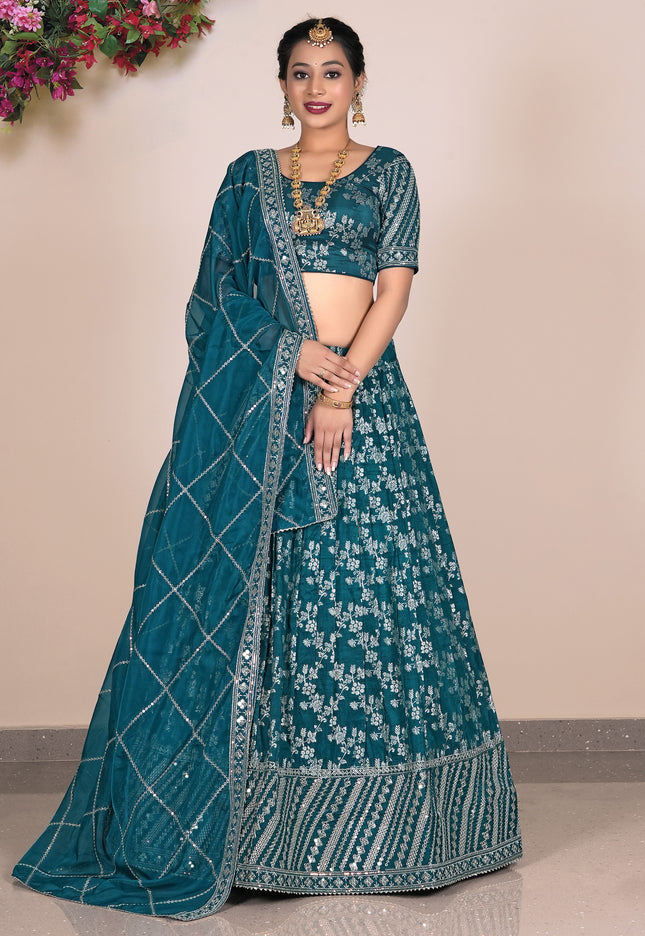 Teal embroidered lehenga with matching blouse