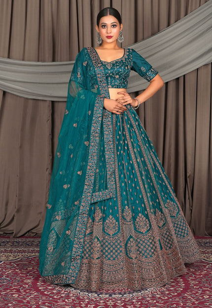 Woman in a teal and brown traditional outfit
