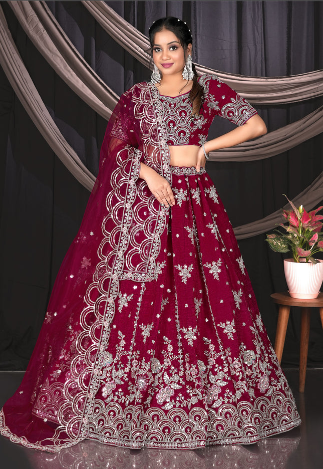 Woman in a Pink embroidered traditional lehenga choli