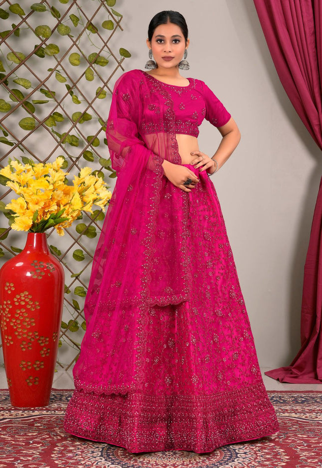 Woman wearing a pink traditional lehenga choli