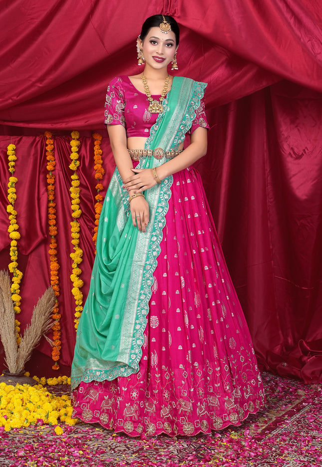 Woman in a pink and green traditional lehenga Choli