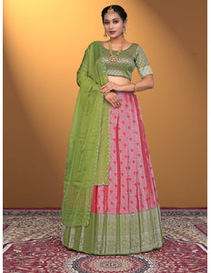 Woman wearing a green and red traditional outfit