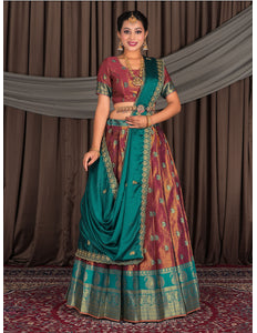 Woman in traditional Indian attire with a maroon lehenga with matching blouse