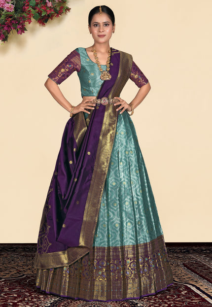 Woman wearing a traditional Sea green lehenga choli