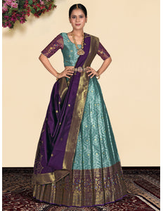 Woman wearing a traditional Sea green lehenga choli