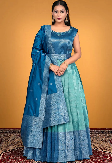 Woman wearing a blue and green traditional outfit