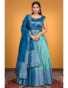 Woman wearing a blue and green traditional outfit